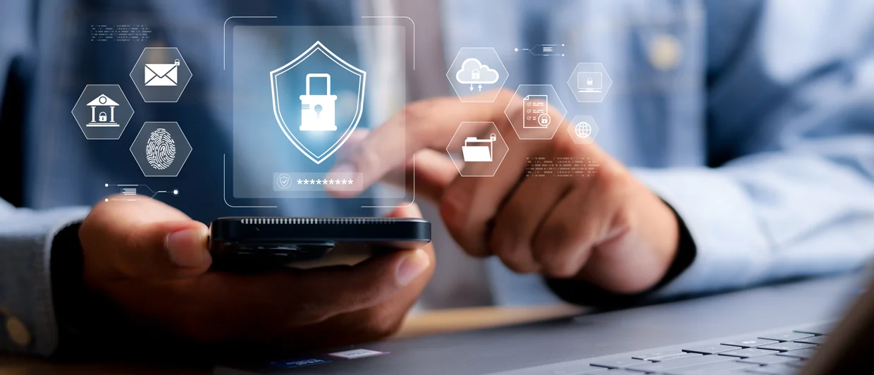 A person uses a smartphone as padlock, fingerprint and email icons symbolize data protection and fraud prevention.