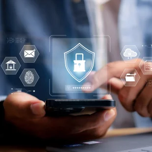 A person uses a smartphone as padlock, fingerprint and email icons symbolize data protection and fraud prevention.